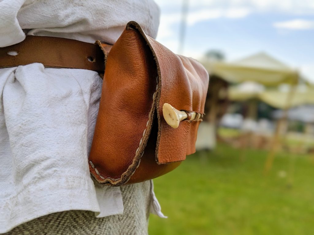 Top 4 Reasons For Dads To Get A Diaper Bag woman in brown leather shoulder bag