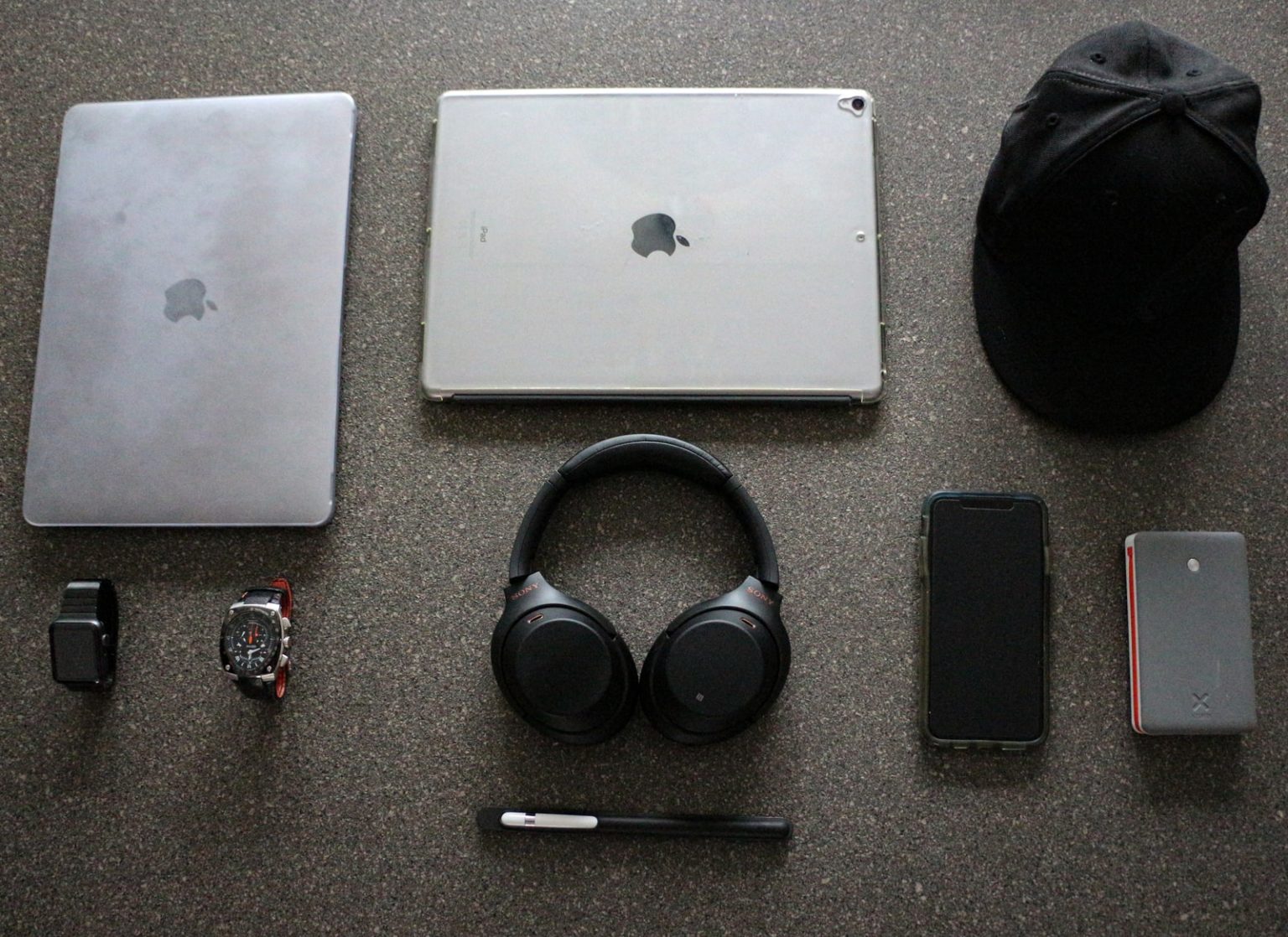 Best Tech Gadgets For Your Business In 2014 black wireless headphones beside iPad