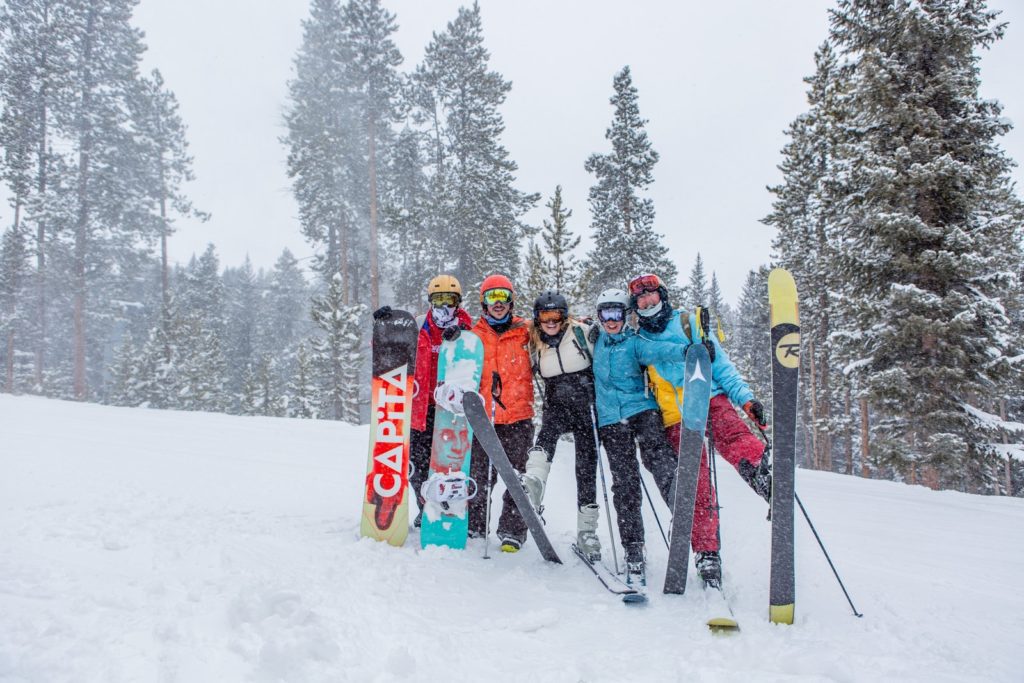5 Reasons Why Single Skiing Holidays Are Awesome people in blue and red jacket and pants standing on snow covered ground during daytime