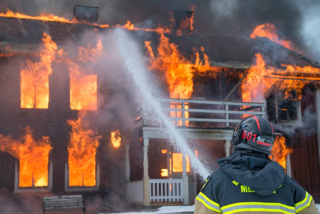 Renters Insurance- Is It The Right Policy To Protect Your Personal Belongings? fireman watering fire